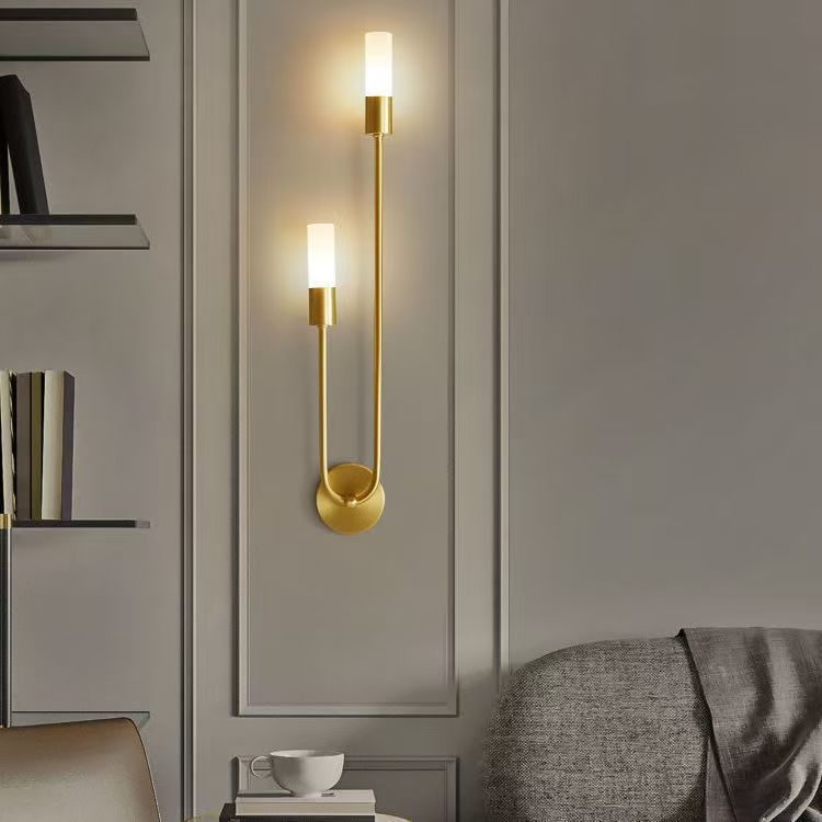 Long bedside wall lamp in the bedroom