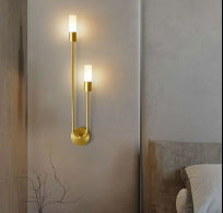 Long bedside wall lamp in the bedroom