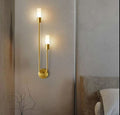 Long bedside wall lamp in the bedroom